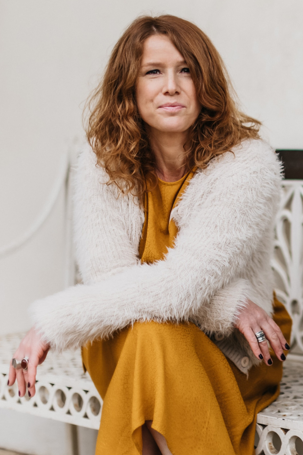 Lorna MacPhail seated in a white cardigan